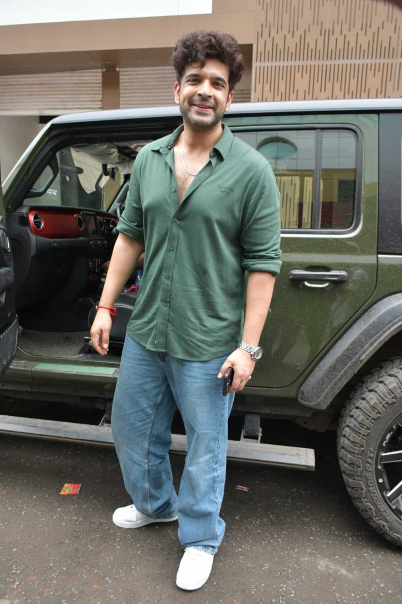 Karan Kundrra stepped out this afternoon. Reportedly, he attended a puja at his ladylove Tejasswi Prakash's new office